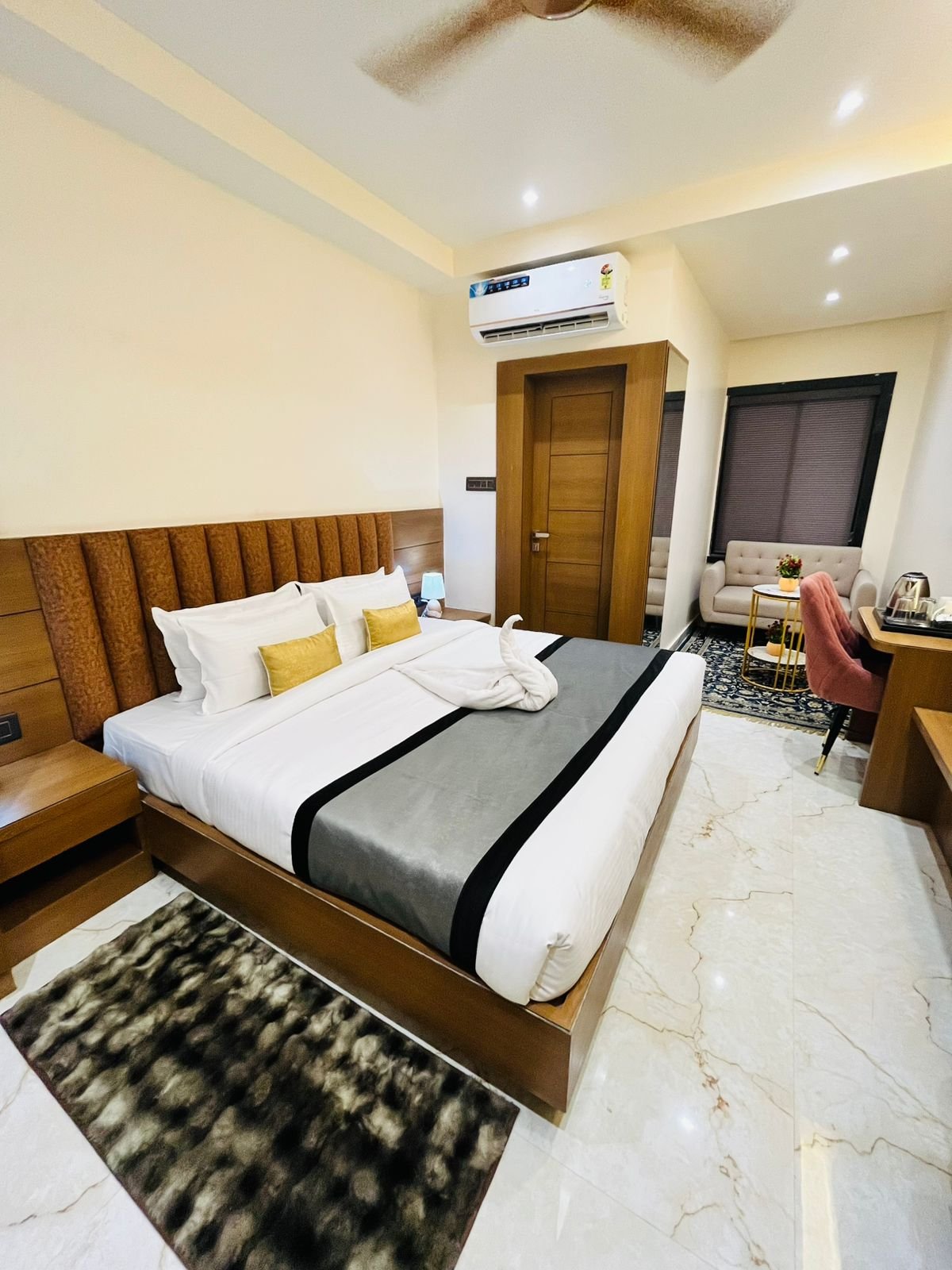 Grand Executive Suite View with Fur Rug & Sofa Nook