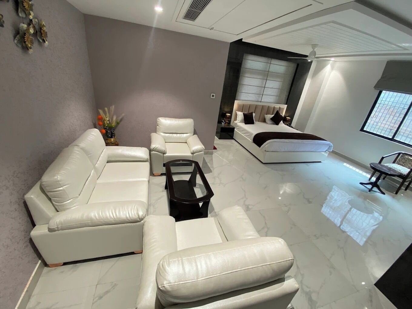Executive Suite with White Leather Lounge